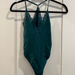 Green spandex body suit